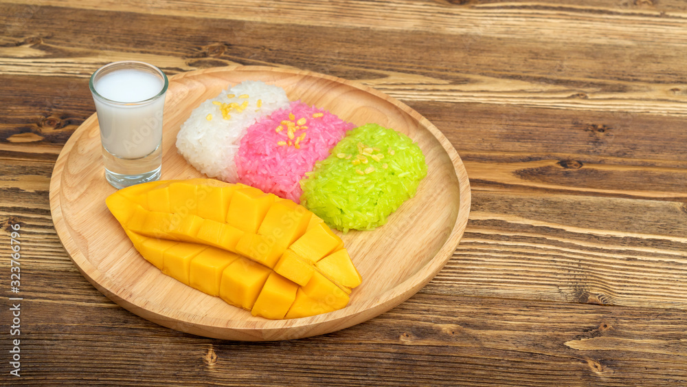 Three colors of sticky rice and ripe mango (Thai dessert). Three colors of sticky rice and ripe mango (Thai dessert).