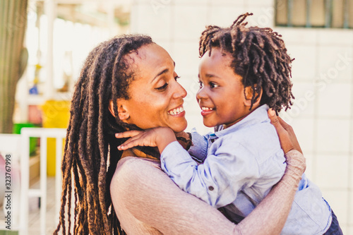 Valokuva Happiness and joyful  black race african family concept with mother and son toge