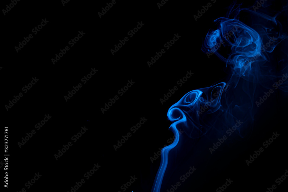 Abstract blue smoke on black background. Aromatherapy concept
