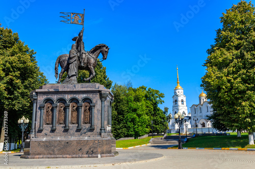 Monument to founder of Vladimir city Prince Vladimir the Red Sun and sanctifier Feodor on the viewing platform with views of Assumption Cathedral in Vladimir, Russia photo