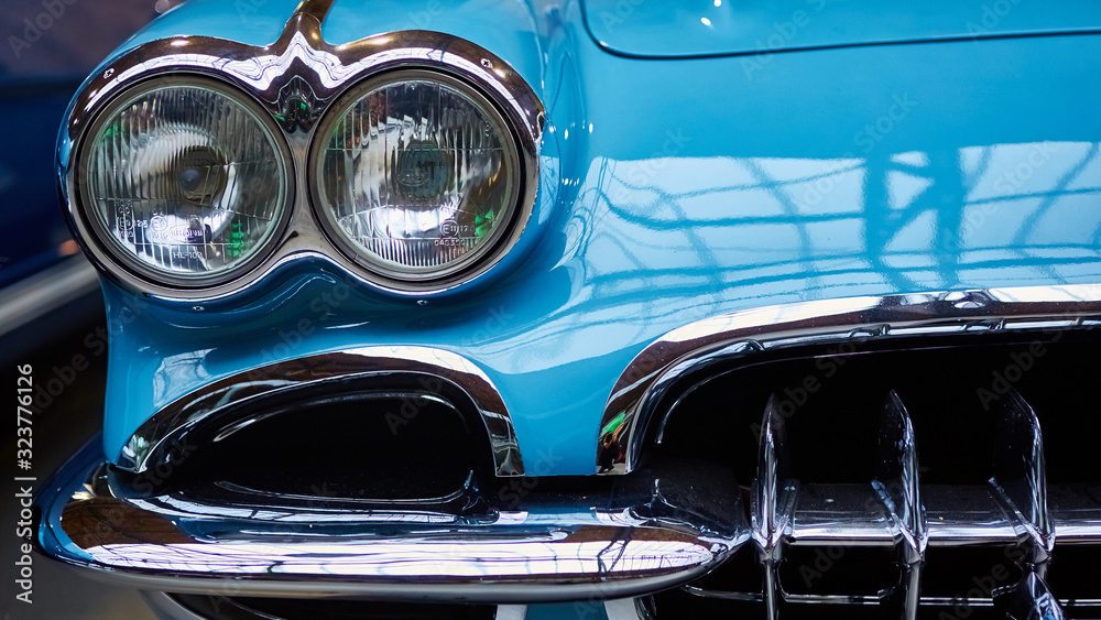 Fototapeta premium Detail of classic car. Close-up of headlight.