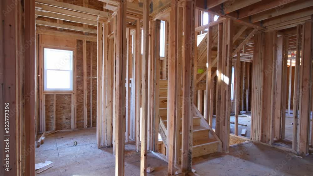 Interior framing beam of new house under construction home framing beam construction Interior framing beam of new house under construction home framing beam construction