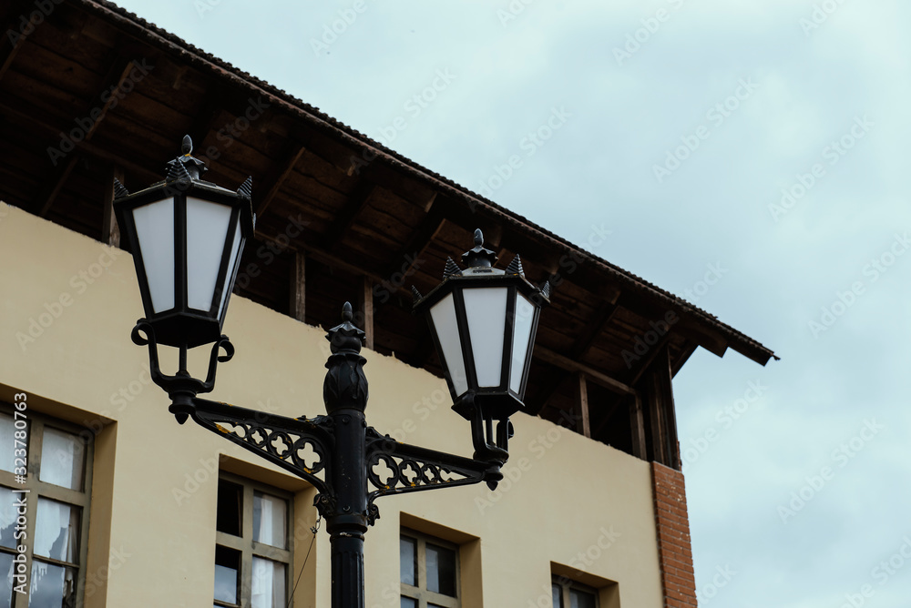 Lantern with apartment building background