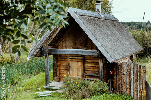 Old traditional vintage timber sauna in the village