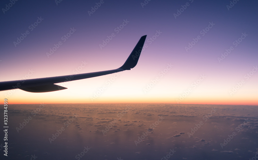 Sunset from airplane window. Sunset from airplane window.