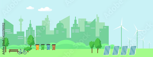 Cityscape with windmills and solar panels.