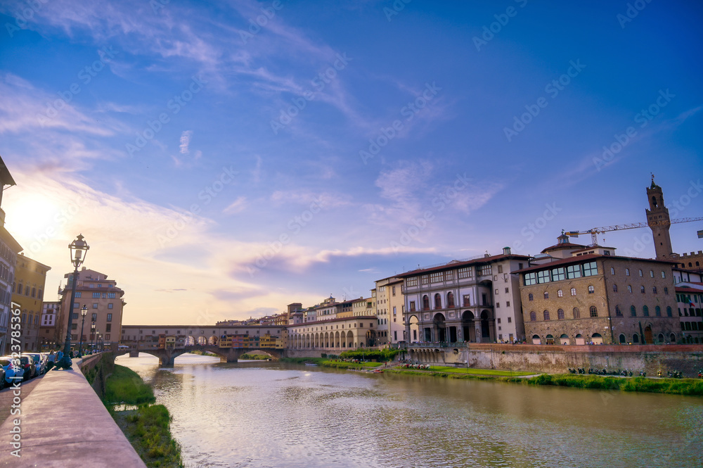 A view along the Arno River towards the Ponte Vecchio in Florence, Italy.