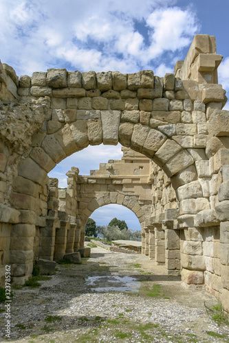 Stone arch structures of the ancient town of Tindari, formerly Tyndaris, Patti, Messina, Sicily, Italy