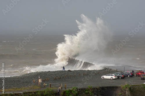 Storm Dennis creates big waves that crash into the seaside town of Aberystwyth , Wales.