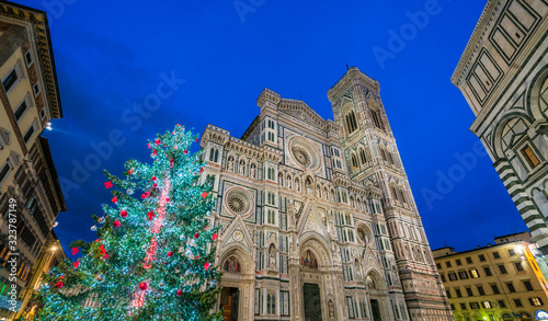 Florence during Christmas time, with the Cathedral of Santa Maria del Fiore and the Christmas Tree. Tuscany, Italy.