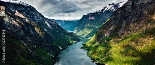 Fotografie, Obraz Panorama of beautiful valley with mountains and river in Norway