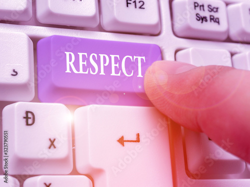 Photography Conceptual hand writing showing Respect