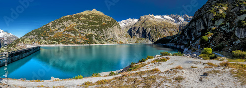 Gelmer Lake near by the Grimsel pass in Swiss Alps photo