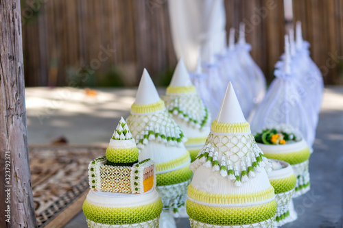 Engagement bowl for Thai engagement ceremony. bride price set, made from banana leaf and garland in thai wedding ceremony for contain wedding ring and flower, KHAN MAAK.  photo