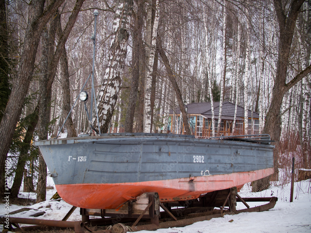 fishing recreation center. retro boat. winter fishing