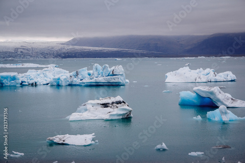 Icebergs in Jokulsarlon lagoon beneath Breidamerkurjokull glacier Sudhurland, Iceland. Place for text or advertising © Andriy