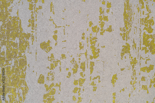 Irregular golden patterns forming an abstract background