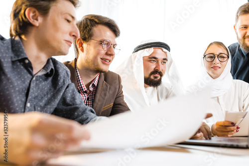 Photography Presentation on a laptop with foreign representatives