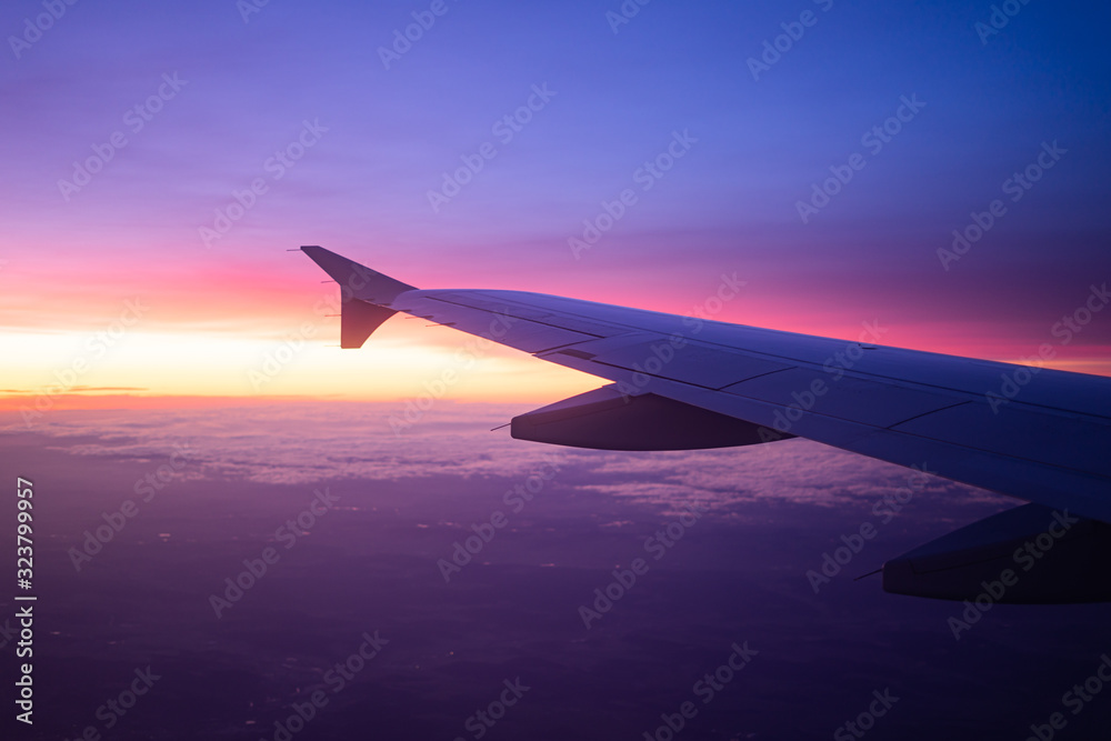 wing view plane in the sky sunrise wing view plane in the sky sunrise
