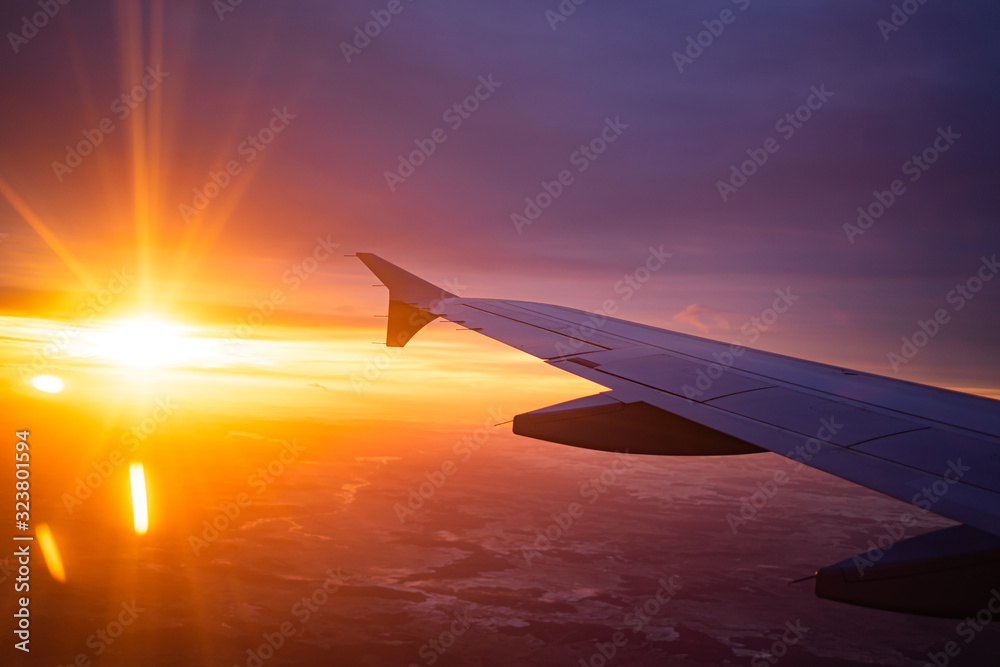 wing view plane in the sky sunrise wing view plane in the sky sunrise