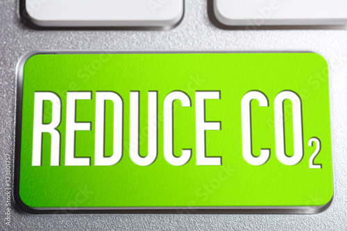 Reduce CO2 On A Green Keyboard Button, Warning For Global Warming Concept