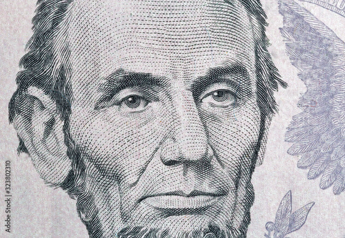 Portrait of US president Lincoln from five dollars bill macro