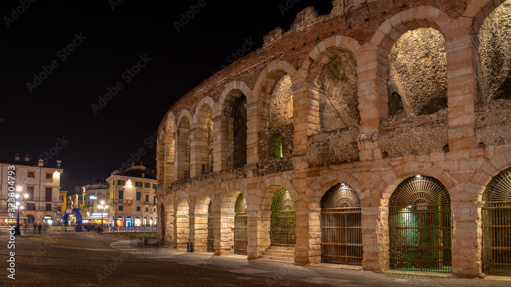 Verona, Italy. Night view of Piazza Bra with the historic arena of Verona, Roman amphitheater in the historic center and symbol of the city
