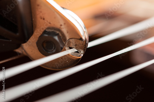 Guitar string cutting equipment isolated on white background photo