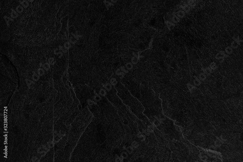 Dark grey black slate background or texture.