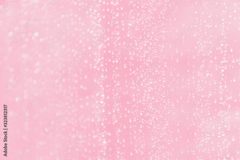 Pink blurred background with water drops pattern