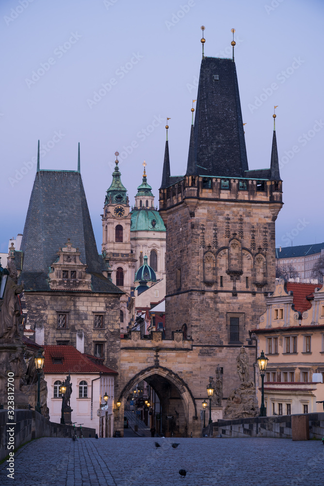 Tower near Charles Bridge in Prague at sunrise Tower near Charles Bridge in Prague at sunrise