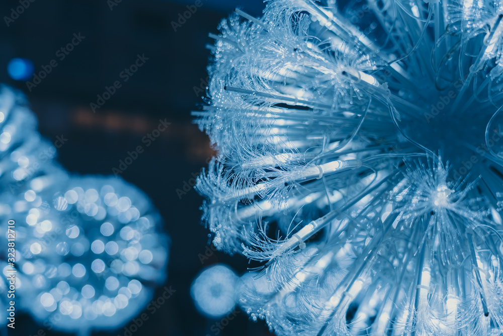 Fototapeta premium Bundle of optical fibers with lights ; background or textures