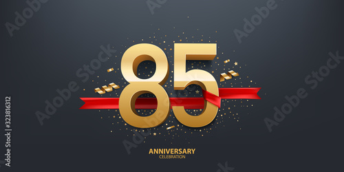 85th Year anniversary celebration background. 3D Golden number wrapped with red ribbon and confetti on black background. photo