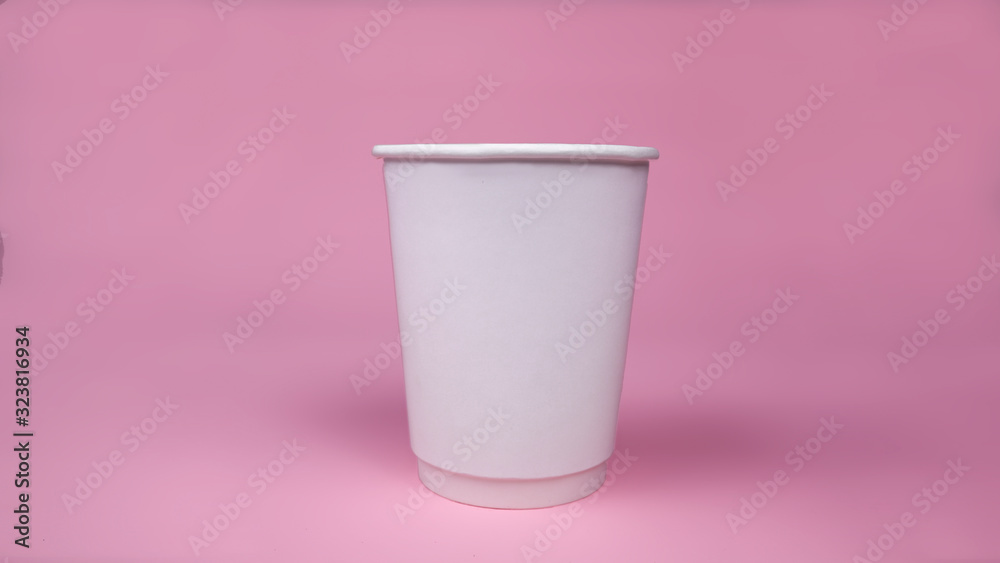 Single cup isolated on pink background Single cup isolated on pink background