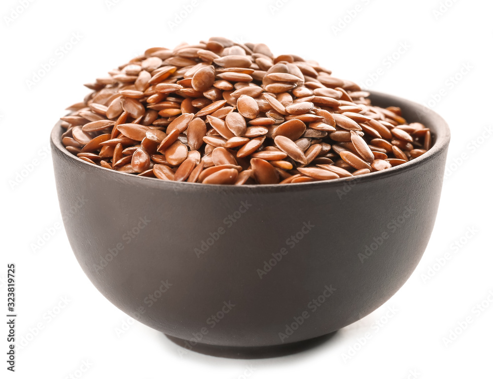 Bowl with flax seeds on white background Bowl with flax seeds on white background