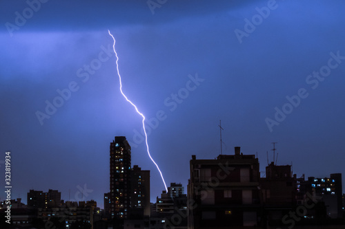 ELECTRICAL STORM ON THE CITY, RAY FALLING ON BUILDING