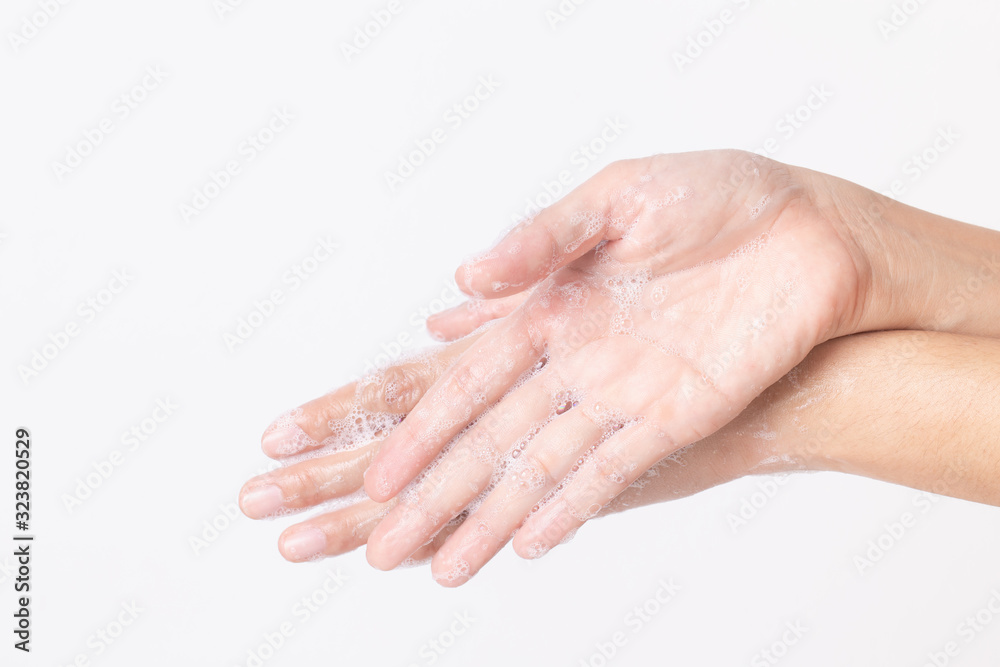 Asian girl hands are washing with soap bubbles on white background. Asian girl hands are washing with soap bubbles on white background.