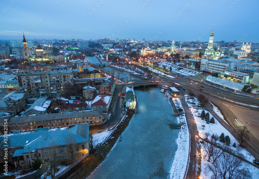 Fototapeta premium Winter evening aerial view to downtown and river in Kharkiv