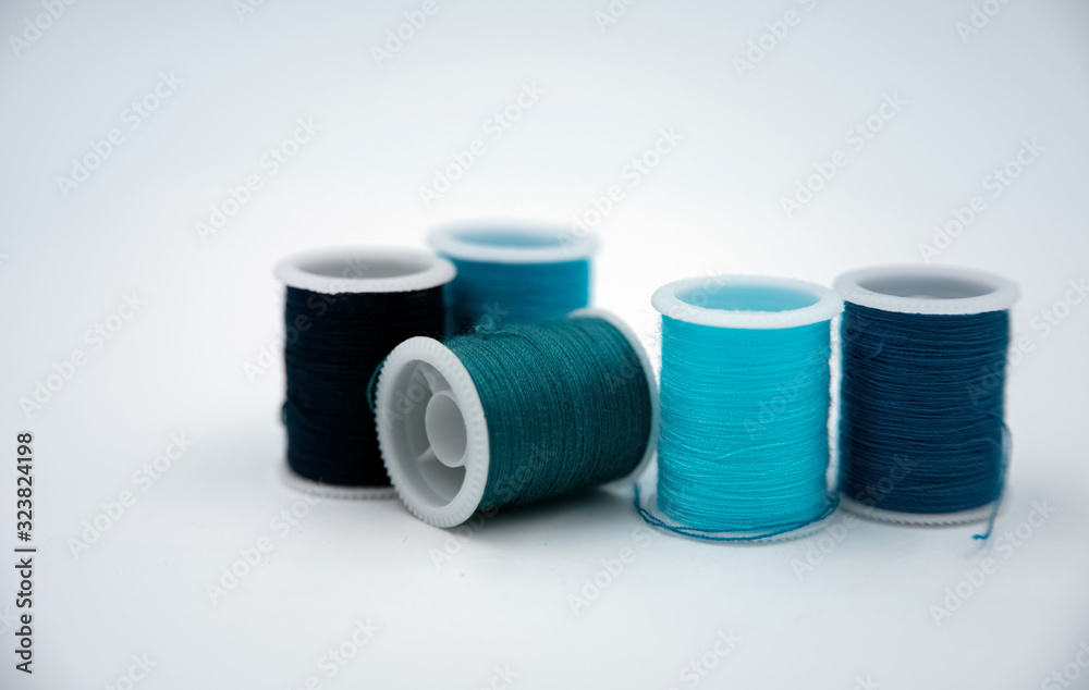 Roll of thread put on white background,show texture,for needle work Roll of thread put on white background,show texture,for needle work