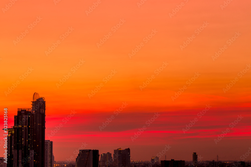 The abstract background of the evening sky and the surrounding buildings, showing the distribution of housing in the capital