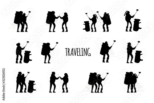 Hikers with backpacks takes selfie in mountains, black silhouette