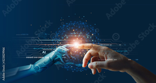 AI, Machine learning, Hands of robot and human touching on big data network connection background, Science and artificial intelligence technology, innovation and futuristic. photo