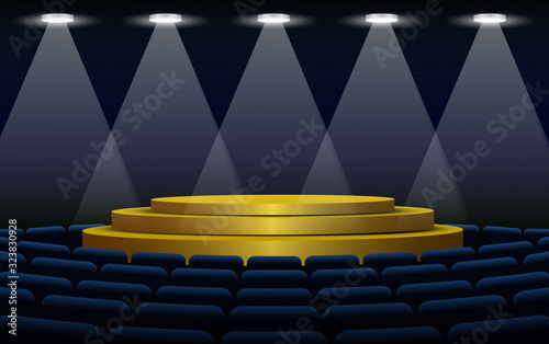 chair and golden stage with spotlight in the hall	