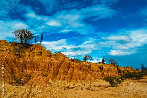 Rocks under the cloudy blue sky in the Tatacoa Desert, Colombia photo
