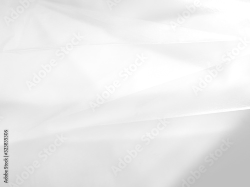 Gradient with white, gray color. Attractive and mystical blurred paper background without focus. A blend of shades and tones. White textured background from tracing-paper.