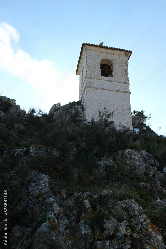 Old bell tower on the top of the rock, Castell de Guadalest, Spain