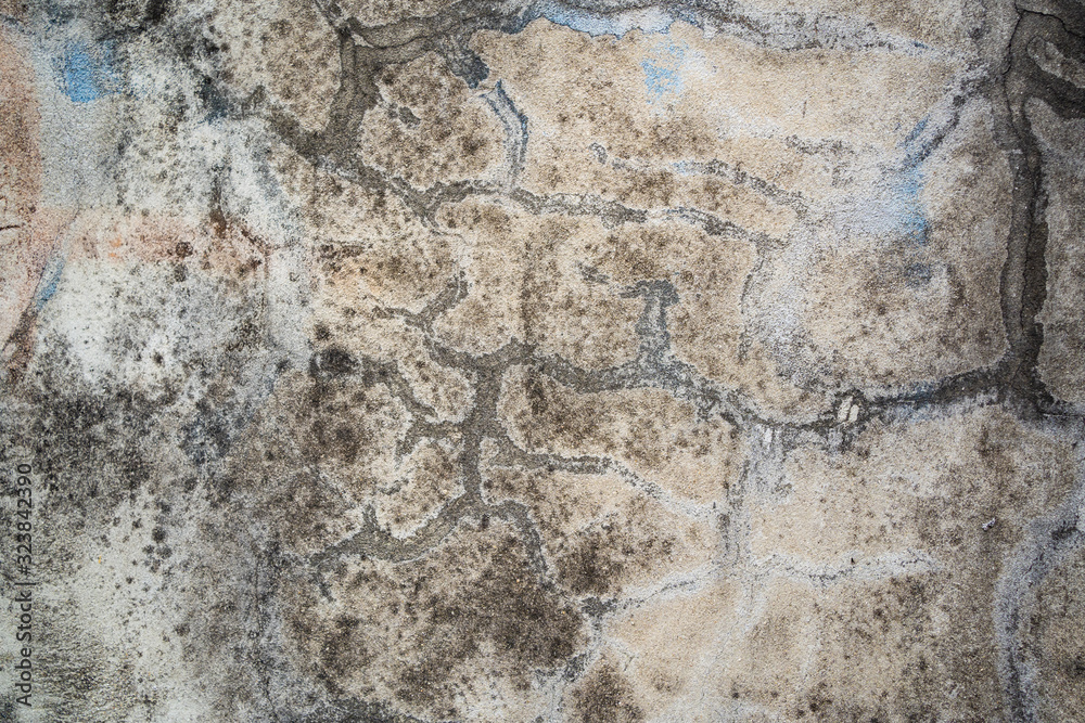 Fotografie old cracked unclean concrete wall background
