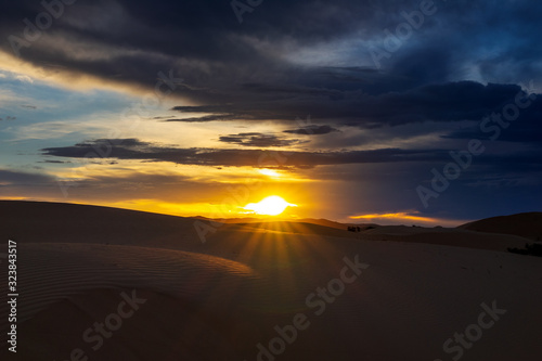 dramatic sunset in desert © Kokhanchikov