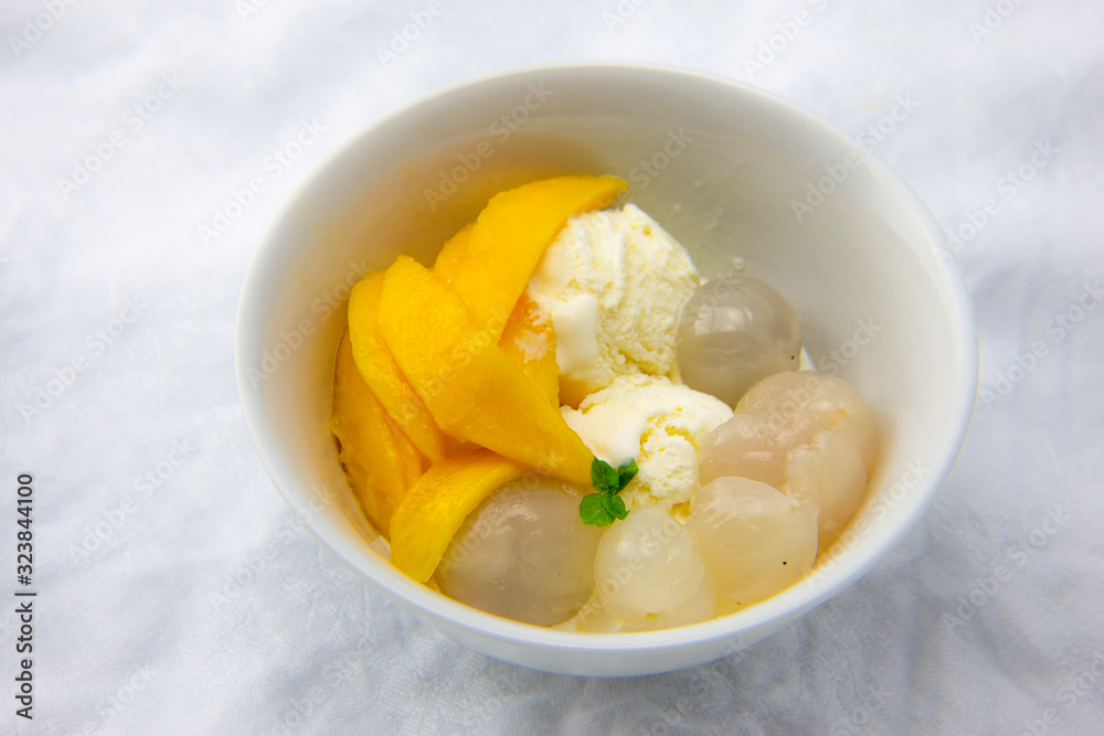 Garnished lychee and vanilla ice cream Garnished lychee and vanilla ice cream