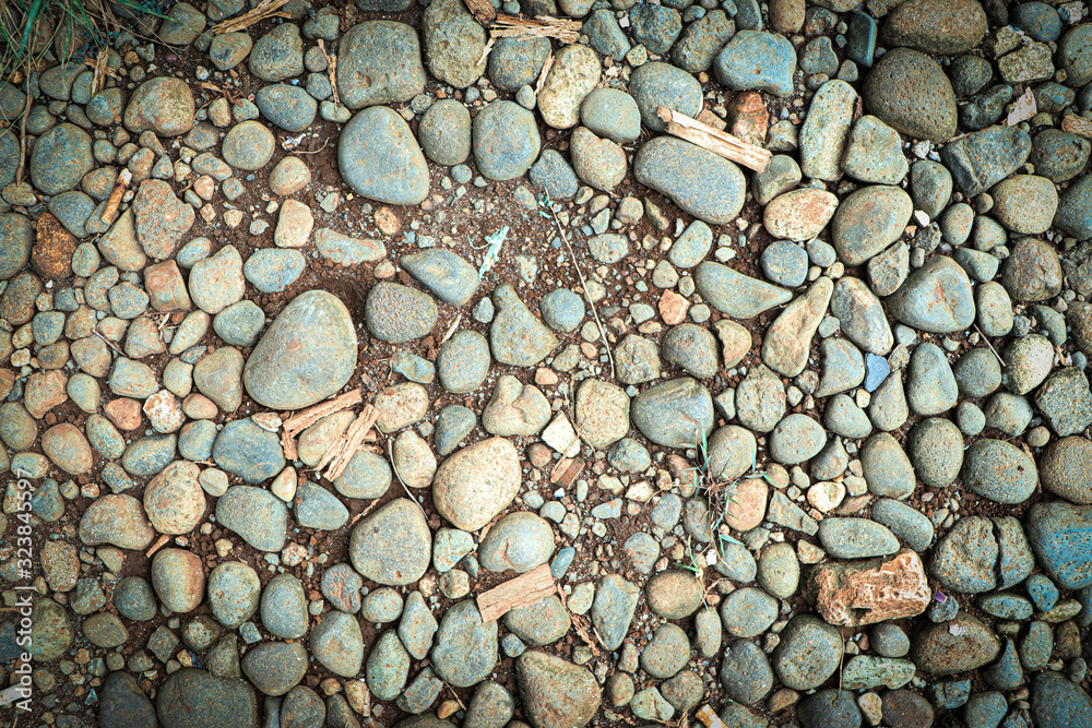 neatly arranged stone against a background of land neatly arranged stone against a background of land